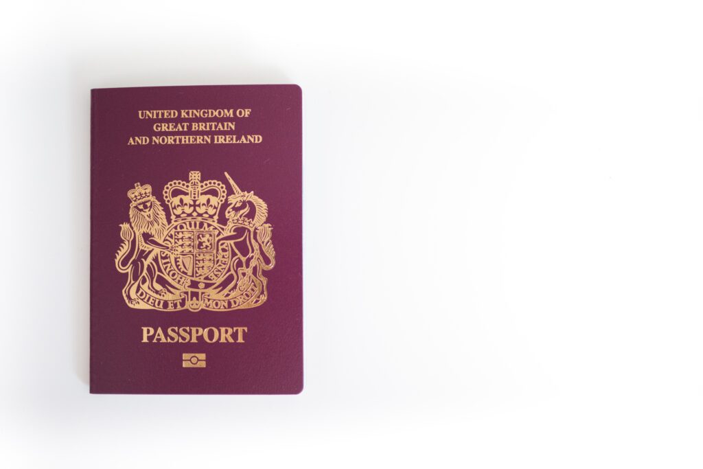 Illustration comparing Skilled Worker visa and Health & Care Worker visa pathways for UK employers in 2025, highlighting eligibility, salary thresholds, and fees.