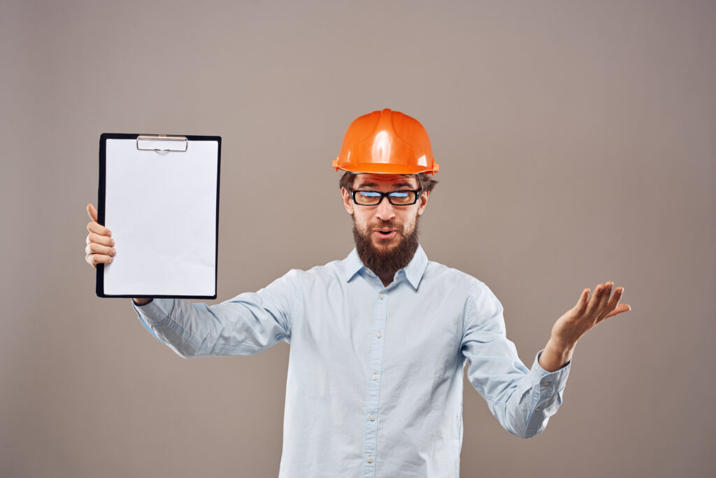 Business owner reviewing the UK Temporary Shortage List to plan skilled worker recruitment in 2025