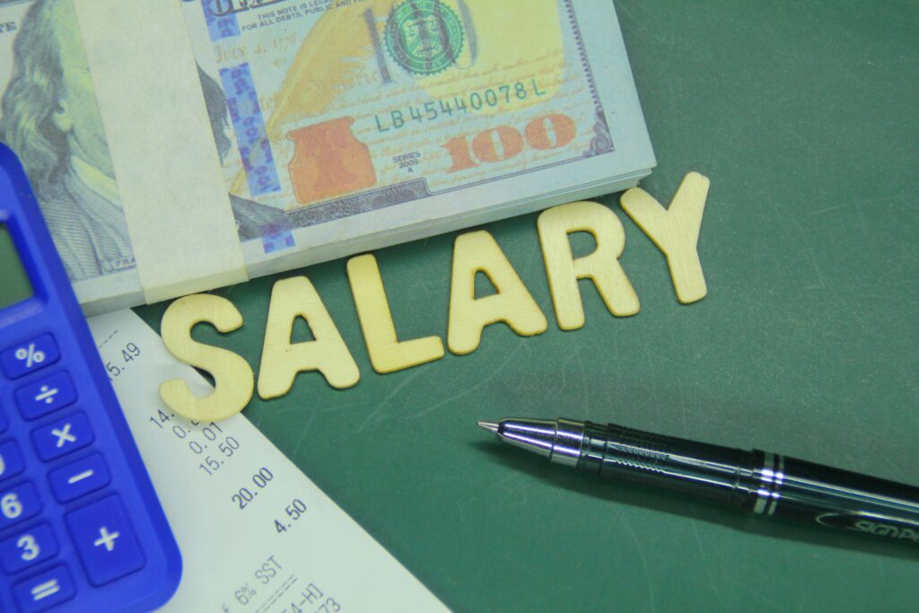 Employer reviewing payroll compliance to ensure a sponsored worker’s salary meets Skilled Worker visa requirements.